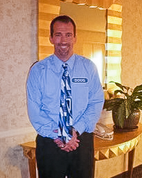 Doug Hobby wearing Wheel of Fortune nametage